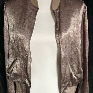 Taupe colored zip up jacket
